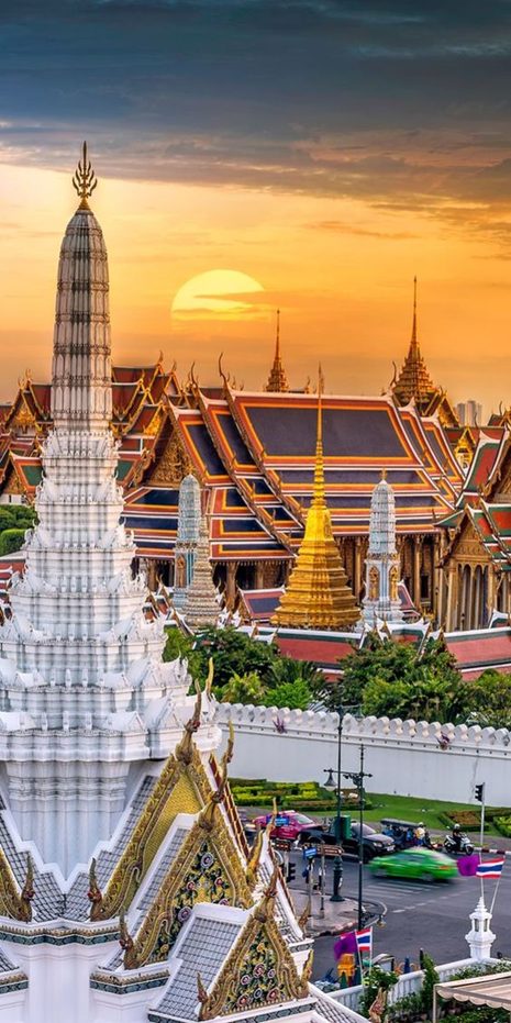 A gilded temple complex at sunset