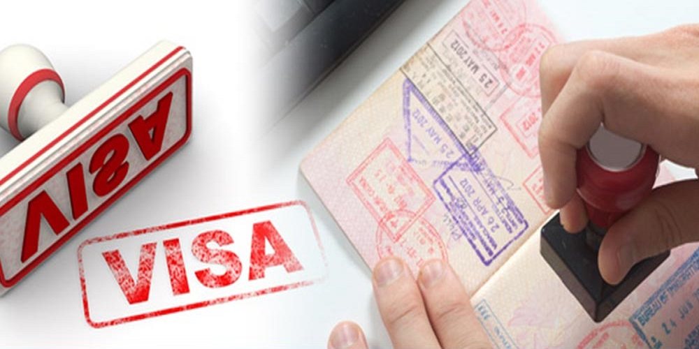 A visa stamp on the page of a passport